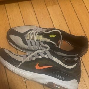 Nike Men's Black and White Sneakers with Orange Swoosh